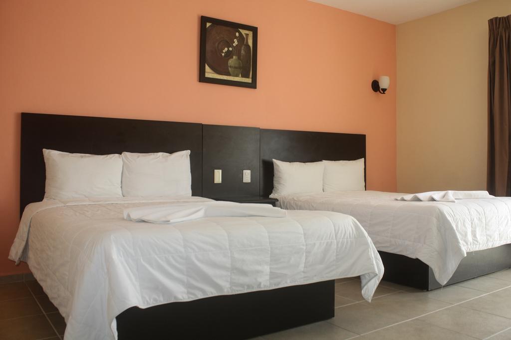 Lua Hotel Чампотон Номер фото